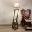 Biped Wooden Floor Lamp with Brown Base and Beige Fabric Lampshade