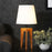 Jet Brown Wooden Table Lamp with White Fabric Lampshade