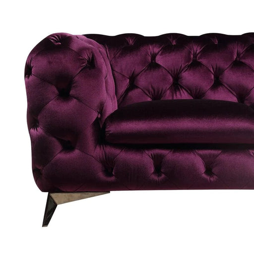 WIDE TUFTED ARMCHAIR