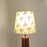 Tall Boy Wooden Floor Lamp With Yellow Printed Fabric Lampshade